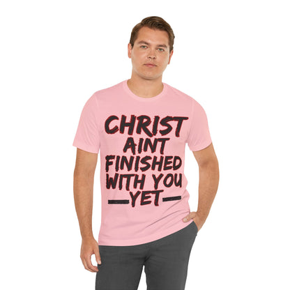 The Holy Fight “Christ Ain’t Finished with You Yet” Motivational Christian T-Shirt – Encouragement in Faith