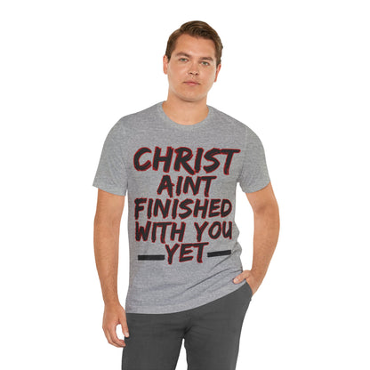 The Holy Fight “Christ Ain’t Finished with You Yet” Motivational Christian T-Shirt – Encouragement in Faith