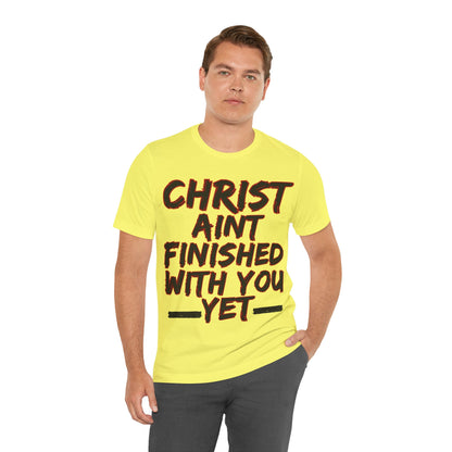 The Holy Fight “Christ Ain’t Finished with You Yet” Motivational Christian T-Shirt – Encouragement in Faith